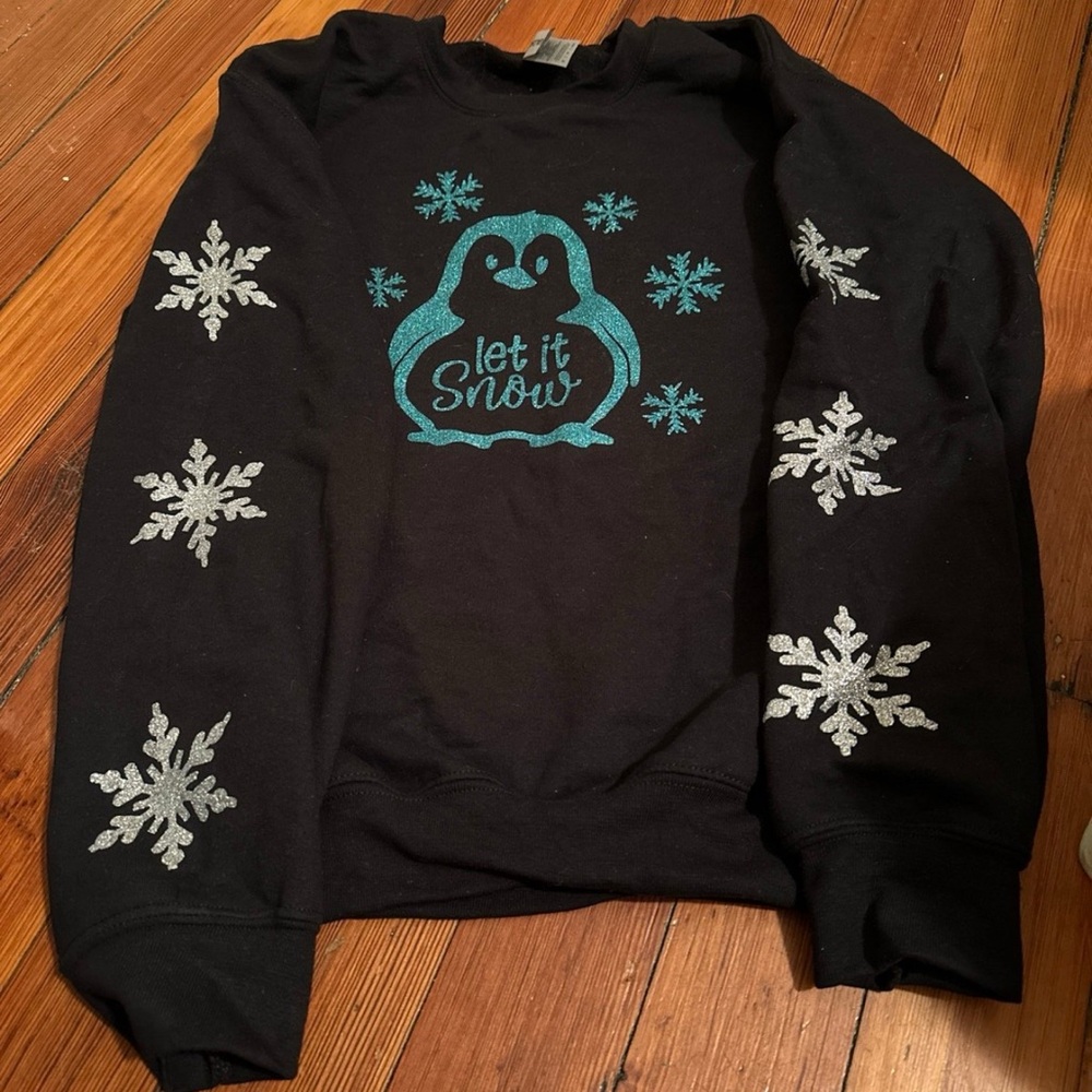 Black Penguin Sweater with Snowflake Design